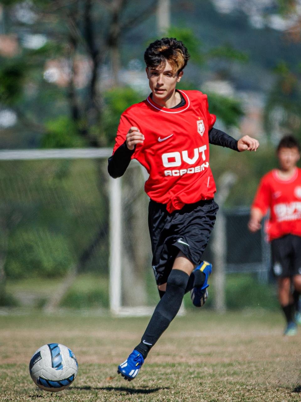 Atleta da OVT Academy em corrida durante o treino